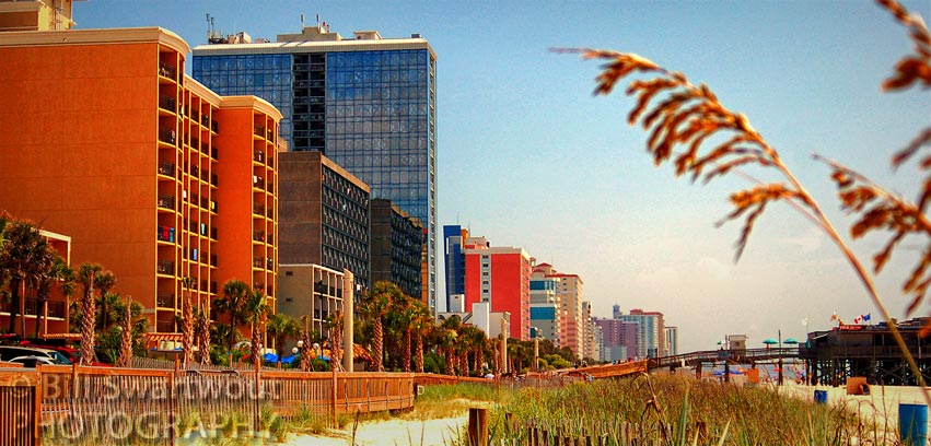 Condominiums and hotels on the beach at Myrtle Beach at the north end of the boardwalk.