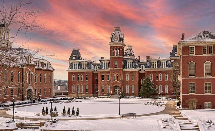 Sunset over snow covered Woodburn Hall