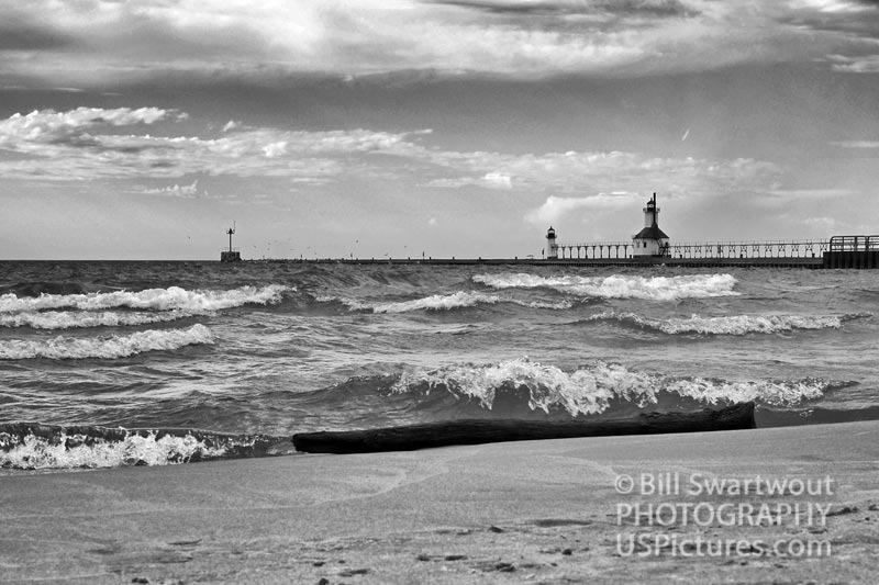 Historic Beacons on a Breakwater in Black and White